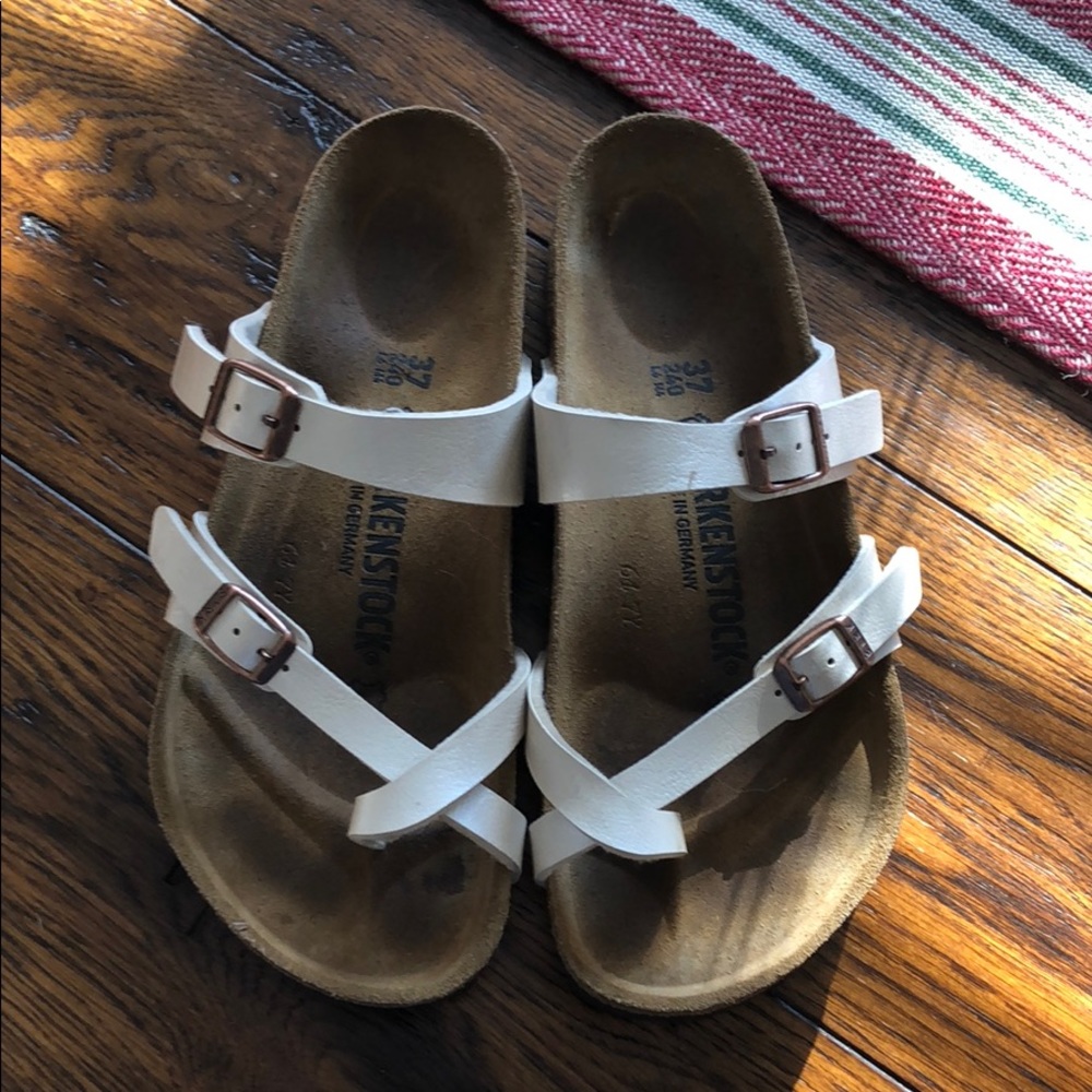 Birkenstock toe loop sandals.
